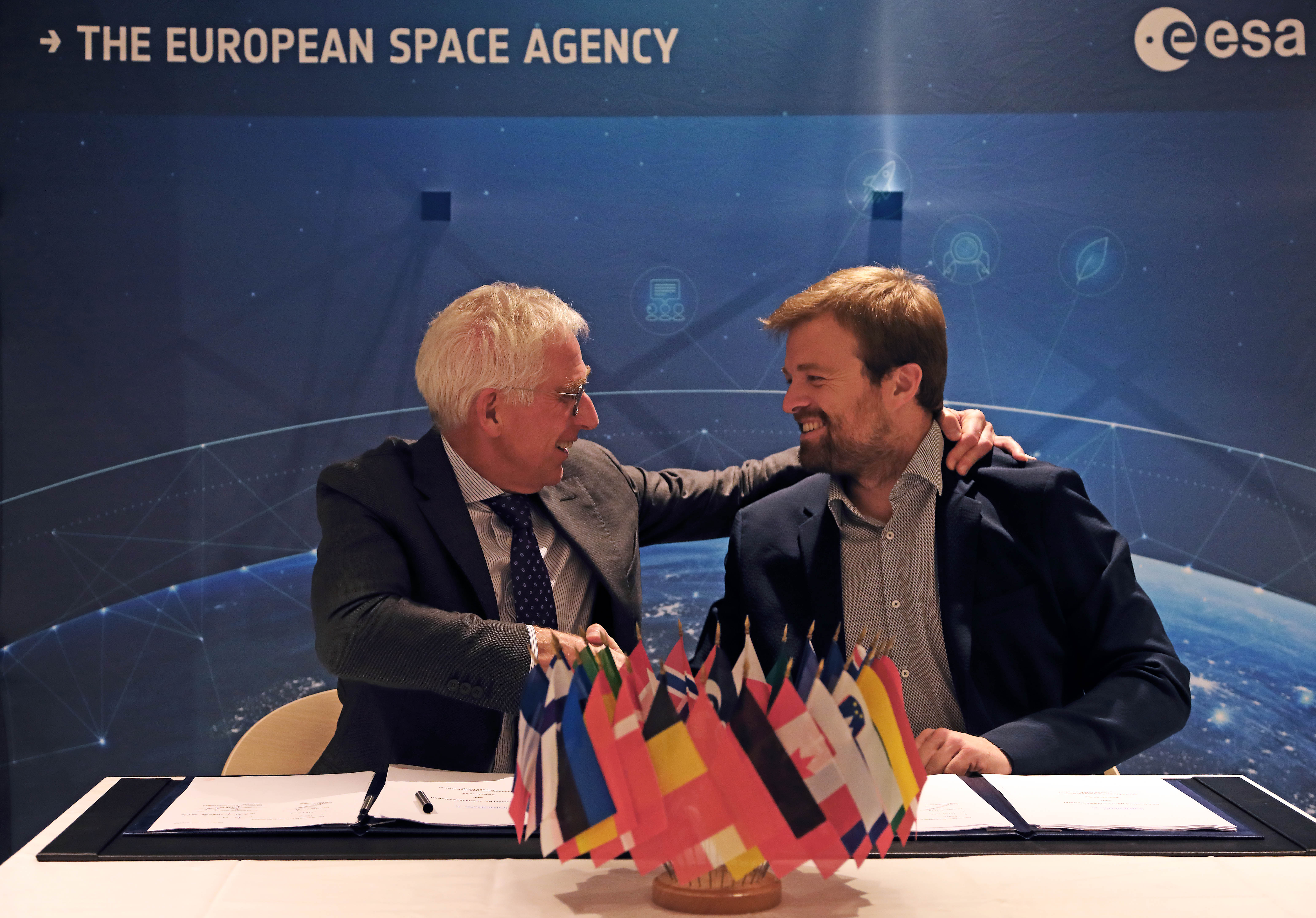 Javier Benedicto, Acting Director of ESA’s Connectivity and Secure Communications, and Emile de Rijk, CEO and founder of Swissto12, complete the signature at ESA Headquarters in Paris.""
